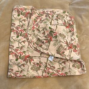 kate quinn swaddle blanket - cream background with green and red botanical print